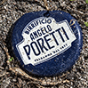 Poretti auf Sand